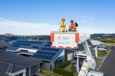 NSW minister for energy and the environment Matt Kean with Endeavour Energy's Ben Thurgar look out across homes taking part in the Off Peak Plus program